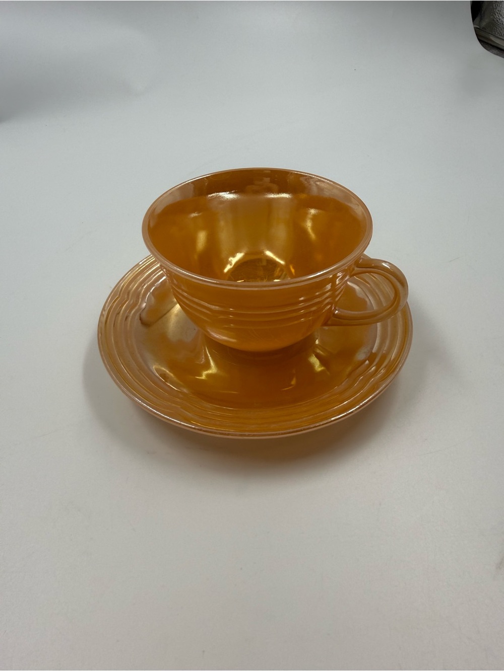 Vintage fire king peach lustreware teacup & saucer